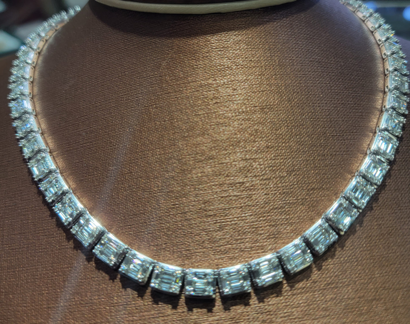 Diamond baguette tennis bracelet worn on wrist